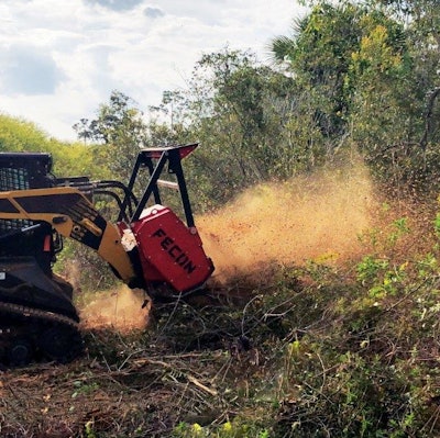 Randy R. Mitchem, Inc. is using a Fecon BLACKHAWK mulcher head such as the one shown to complete a variety of land clearing projects.