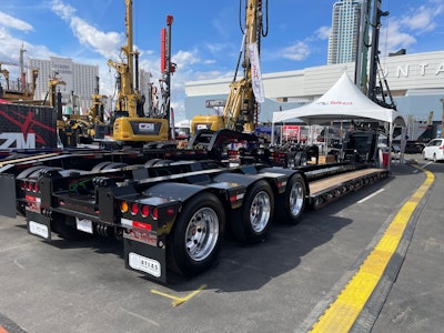 The custom trailer maintains a 70-ton rating at half the deck length and offers 6-in. loaded road clearance.