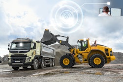 The dump truck and wheel loader are connected through Connected Load Out.
