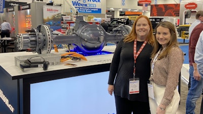 Editor-in-Chief Lori Ditoro talks with the Allison Transmission team during Work Truck Week 2023.