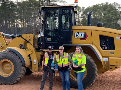 Left to right: Small hydraulic excavator winner Azaria Biven, overall winner and wheel loader winner Kait Burds, and compact track loader winner Kenzi Tackette