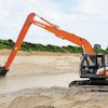 The ZX210LC-7H Super Long Front (SLF) excavator provides 50 ft., 4 in. (15.35 m) of reach at ground level and a 39-ft., 2-in. (11.94-m) dig depth.