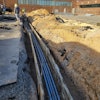 The project required extensive trenching to install EV charging stations.
