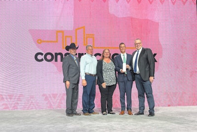 Tarlton Corp. won a Merit Award in the 2022 Construction Risk Partners Build America Awards from the Associated General Contractors of America for its work on the Michael and Quirsis Riney Primate Canopy Trails at the Saint Louis Zoo. The first-of-its-kind immersive outdoor expansion encourages learning through play for the exhibit’s inhabitants and visitors. Pictured left to right are 2022 AGC of America President Bob Latham; Jeffry Peterson, Tarlton superintendent; Diane Grimsley, Tarlton senior project manager; and Andy O’Brien, partner and Joe Charczenko, partner, Construction Risk Partners, LLC. Photo courtesy of Tarlton Corp.