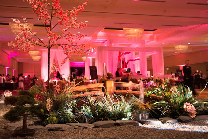 Chicka Chicka Boom Boom and Amaryllis created a mini Japanese garden inside the ballroom complete with a pond, wooden bridge, live plants, and a cherry-blossom tree.