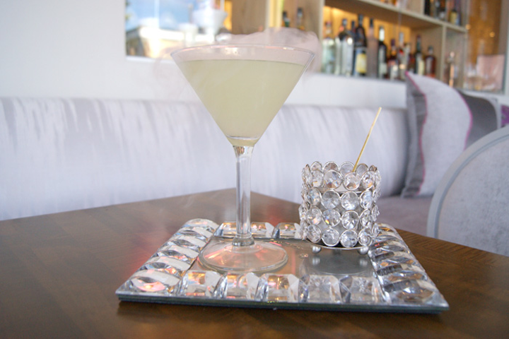 In Los Angeles, restaurant and catering firm Barton G. has a flashy cocktail suited for a New Year's Eve event. Served with a sugar stick and a citrus-vodka popsicle, the drink combines citrus vodka with triple sec and lemonade.
