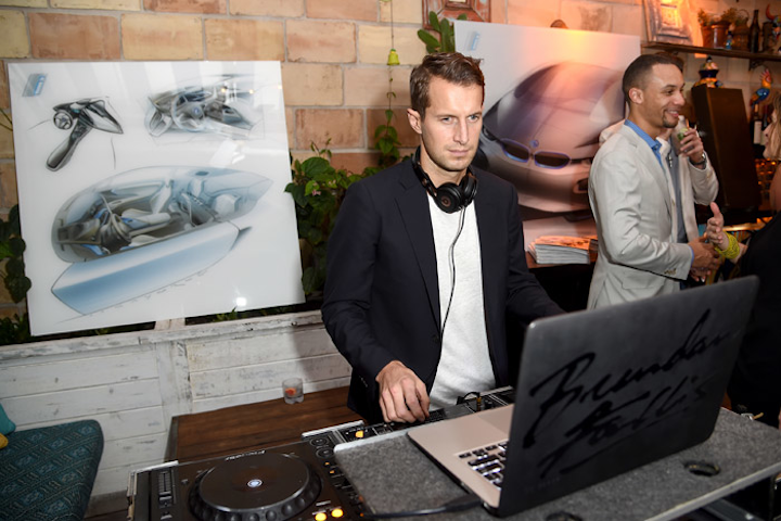 Following a collaboration at Frieze London, BMW i and Soho Beach House again hosted an art talk and reception to mark Art Basel Miami Beach. DJ Brendan Fallis set up in front of drawings of the BMW i series electric cars at the December 2 event.