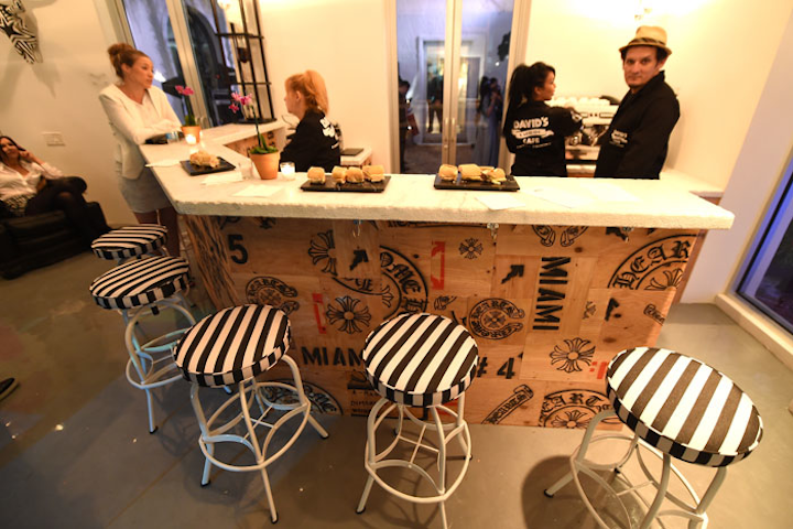 Chrome Hearts, a Los Angeles-based accessories, leather, and furniture company, opened a Miami store with an event December 3. It included a performance by Zoe Kravitz of Lolawolf and a DJ set by Atlanta DeCadenet-Taylor. Owners Laurie Lynn Stark and Richard Stark designed the interiors, including the counter and bar stools at its David’s Café.