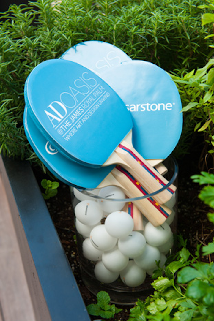 Sponsor Caesarstone provided stone surfaces for the bars—as well as a custom ping-pong table. Bright blue paddles featured the company's logo as well as the event's logo.