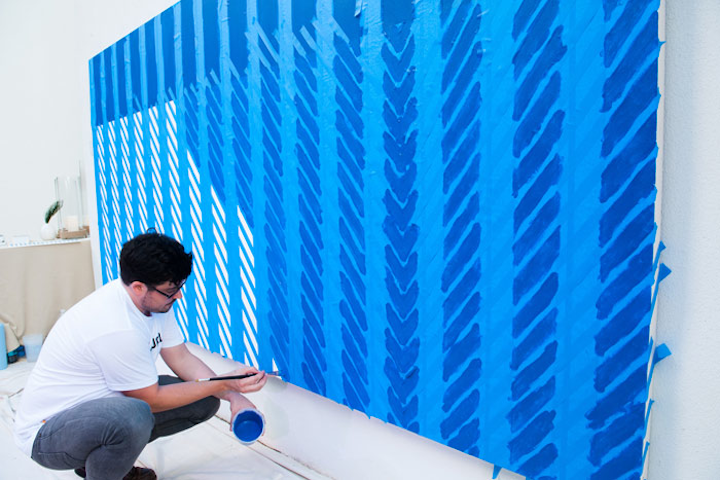 The AD Oasis hosted a full slate of programming December 4 to 6 and worked with art partners such as Indiewalls to create art on site. Artist Mike Serafino painted a vibrant beach scene from a space near the entrance of the event.