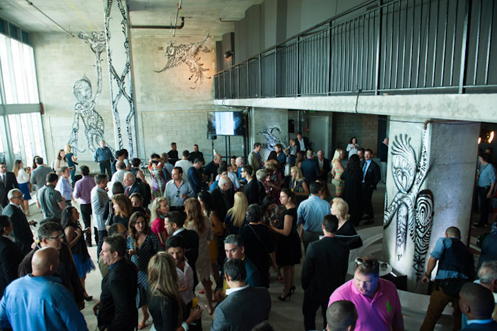 Guests gathered for brunch and cocktails followed by the groundbreaking for the One Thousand Museum residential building, which is being designed by Zaha Hadid Architects. The walls of the space were covered in custom murals by Jona Cerwinske.