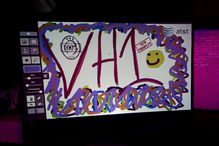 Sponsor AT&T invited guests to contribute to a digital graffiti wall at the Official VH1 & Scope Party.