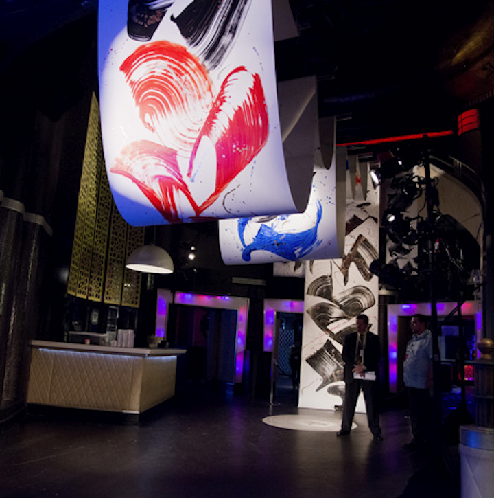 Artist and calligrapher Aerosyn-Lex Mestrovic hand-painted hundreds of feet of Japanese synthetic paper, creating an art installation that event planners described as the longest continuous painting shown during this year's art fairs.