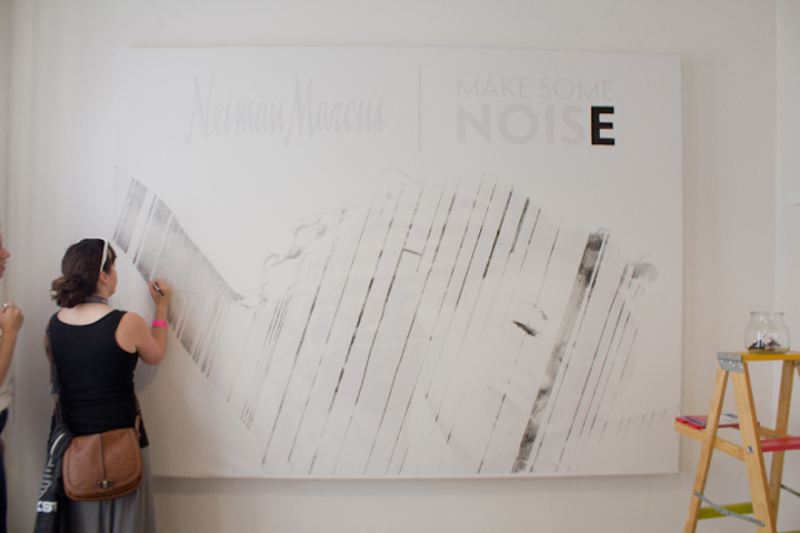 During SXSW music, Neiman Marcus transformed a bungalow into an inspiration house where each room had an inspired-by theme. The music room featured hanging headphones playing music from presenting artists. Guests were invited to help fill out a pointillism mural in the art room.