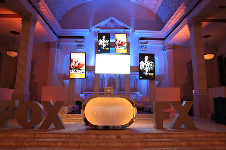 Oversize logo decor pieces dotted the party space.