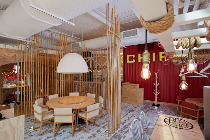 Chef José Andrés's much-anticipated Peruvian restaurant China Chilcano opened in January on 7th Street in Penn Quarter. The 158-seat restaurant offers tastes from Peru's native Criollo, Chinese Chifa, and Japanese Nikkei cuisines. All three cultures have inspired the restaurant’s vibrant design. There’s a huge mural of a woman’s face on one side of the restaurant, decor inspired by shipping containers, and a neon lighting installation inspired by Peru’s ancient Nasca lines. The restaurant offers unique semiprivate dining options from seating at the ceviche bar to seating at a recessed Japanese tatami table.
