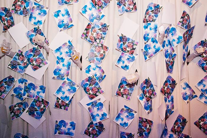 Stamford, Connecticut-based Marcia Selden Catering & Event Planning's edible art installation is a conversation starter for holiday parties, corporate events, and other gatherings. The interactive food and beverage station includes behind-the-scenes staff, who wear long white gloves and hand out menu items, like the 'Apple-y Ever After” cocktail at the Knot gala (pictured), through discreet holes in a hanging curtain. Pricing is available upon request.