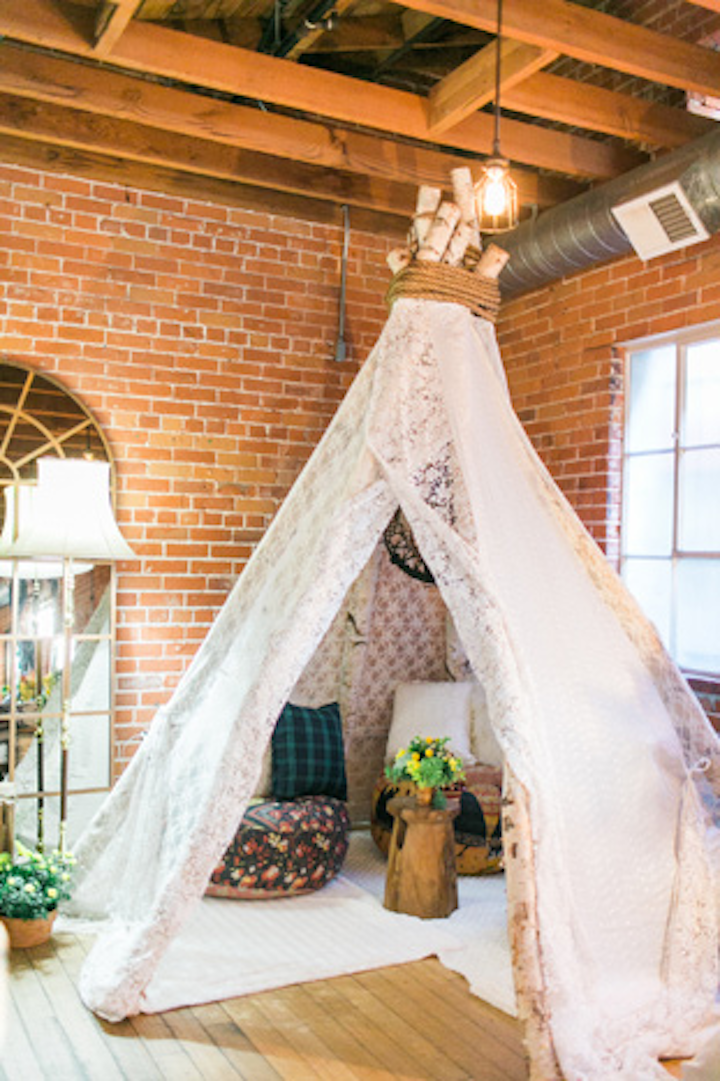 At Tassels and Tastemakers, event designer Mindy Weiss created a luxe lace teepee setup.