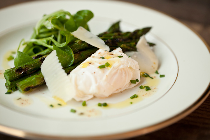 A vegetarian dish was poached eggs served with asparagus.