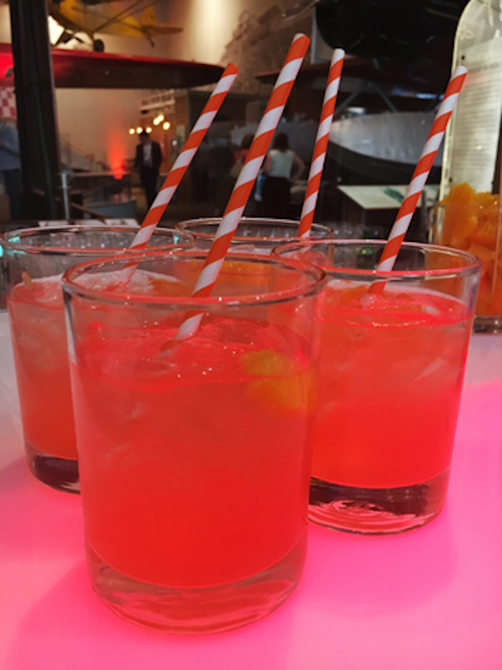 The second-floor bars served the Tanger-tini, sponsored by Tanger Outlets, on the rocks, mixing orange juice, orange vodka, and triple sec with a splash of lemon-lime soda and grenadine.