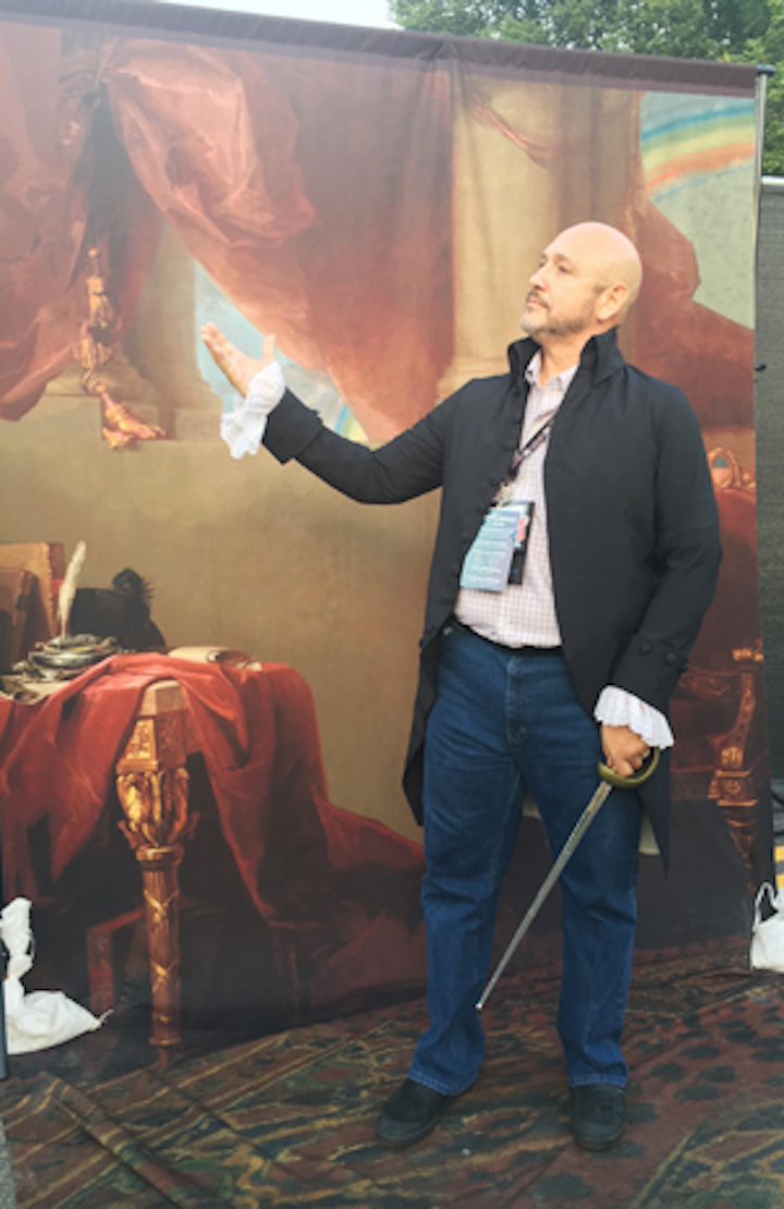 Historically dressed actors from Mount Vernon roamed the block party on 4th Street and brought historical backdrops for guests to use as photo ops.
