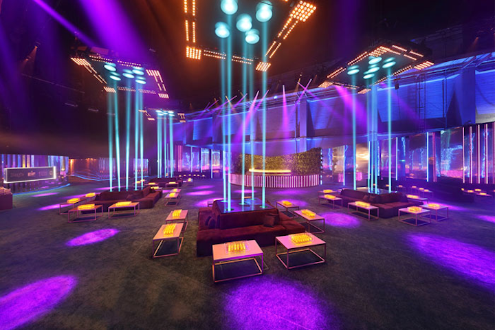 The colorful lighting changed throughout the evening, bouncing off the mirrored walls to create prisms of light.