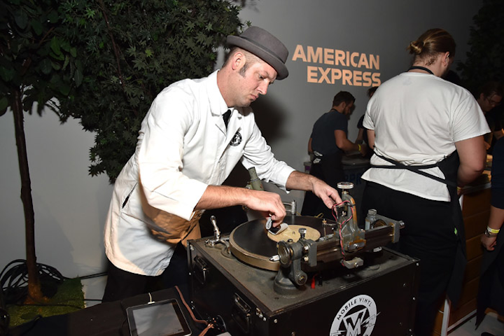 To celebrate the release of his latest album, Justin Timberlake partnered with American Express to host a nature-inspired listening party on January 16 and 17 at Skylight Clarkson Square in New York. Guests received a freshly made record of Timberlake’s first single, “Filthy,” from Mobile Vinyl Recorders, who were onsite pressing the vinyl records. Based in Seattle and Tucson, Arizona, the audio engineers can bring as many as 12 vintage record lathes to events to create records in real time for attendees.