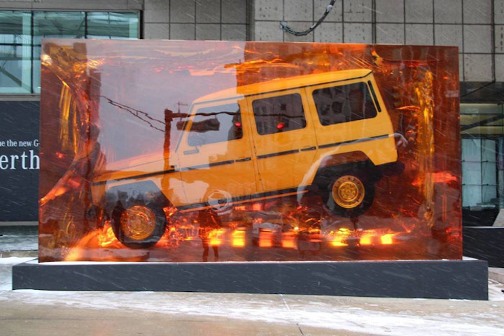 The North American International Auto Show kicked off January 13 and runs through Sunday at the Cobo Center in Detroit. To celebrate the global debut of its new G-Class, Mercedes-Benz created an installation that involved dipping an SUV in 44.4 tons of synthetic resin. The structure, which is displayed at the venue entrance, symbolizes the timelessness of the off-road legend and makes a conscious reference to the natural phenomenon of insects preserved in amber. Markenfilm Crossing produced the resin cube.