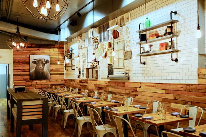 The White Bull, a farm-forward American restaurant that serves seasonal dishes made exclusively with Georgia ingredients, opened in Decatur in March. The restaurant, which is owned by executive chef Pasquale “Pat” Pascarella and partner Gabriele Besozzi, gets its name from novelist Ernest Hemingway’s name for a blank piece of paper. The name also serves as inspiration for the venue’s design, which features a neutral color palette. The menu includes vegetable-focused dishes and pasta made with flour stone-ground in house. Available for semiprivate events, the 3,250-square-foot restaurant seats 100 guests or holds as many as 120 for receptions.