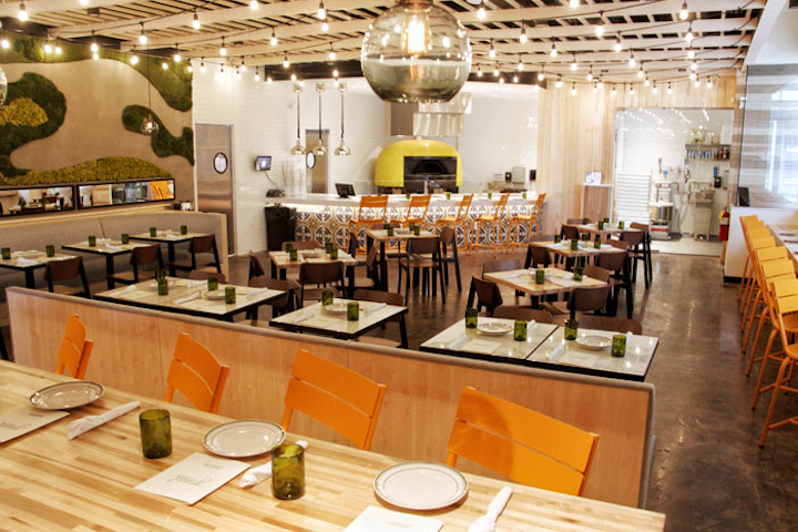 Genuine Pizza, a casual pizza restaurant from Miami-based James Beard Award-winning chef Michael Schwartz, opened its first Atlanta location in January. Along with classic pies, the restaurant offers inventive dishes including a short rib pizza and polenta fries with spicy ketchup. The 2,829-square-foot restaurant seats 64 guests in the main dining room and 36 guests at an outdoor dining area. For private meetings and events, the space has a private dining room that seats eight guests.