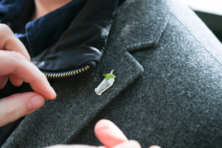 Mint julep lapel pins given out to guests also celebrated the drink.