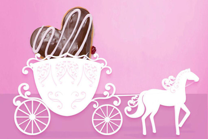 Dunkin’ Donuts debuted its Royal Love Donut, which is available in its stores nationwide through May 20. The heart-shaped doughnut is filled with jelly and frosted with chocolate icing and strawberry drizzle. On May 14, Dunkin’ Donuts promoted the new flavor with a horse-drawn carriage designed in brand’s pink and orange colors, which you can see here.