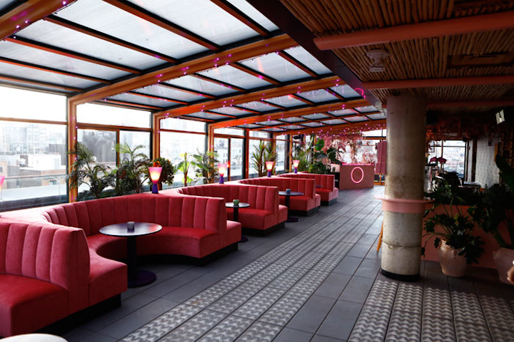 Make Believe, the rooftop of Sixty LES hotel in New York’s Lower East Side, opened on April 18. The concept is designed to mimic an exotic atmosphere, with inspiration from East Asian and North African cultures. The new rooftop venue provides 2,000 square feet of event space with the roof open, and 1,400 square feet with the roof closed. Scarlet hues, bird cages, and tropical greenery add to the decor of make the venue, which holds 150 for receptions. The bar menu offers cocktails suited to its exotic theme, as well as a variety of sake.