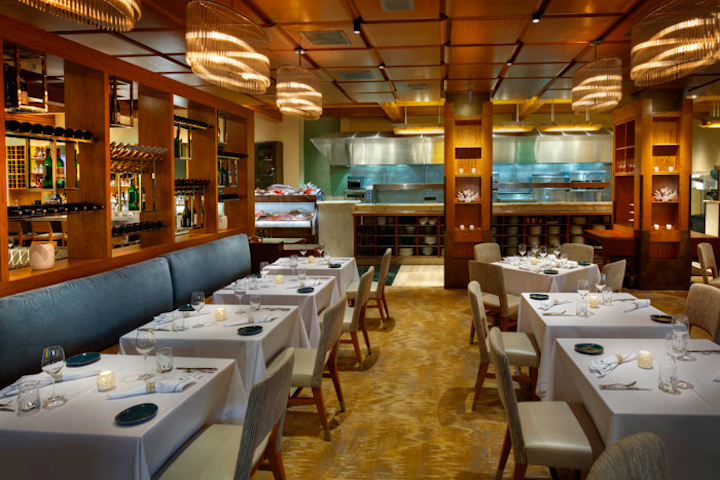 Michael Mina Bellagio reopened in April, offering a re-imagined concept that focuses on fresh seafood feasts at marketplaces and seaside villages around the world. Chef Michael Mina created a “Market List” menu that serves seafood from Japan, the Mediterranean, and France. The restaurant also underwent a complete renovation and now has an expanded dining room with a raw bar, plus a new lounge space and a new private dining room that seats 24 guests, offering a view of the Bellagio Conservatory and Botanical Gardens. The venue, which is available for full buyouts, can hold as many as 200 guests for receptions.