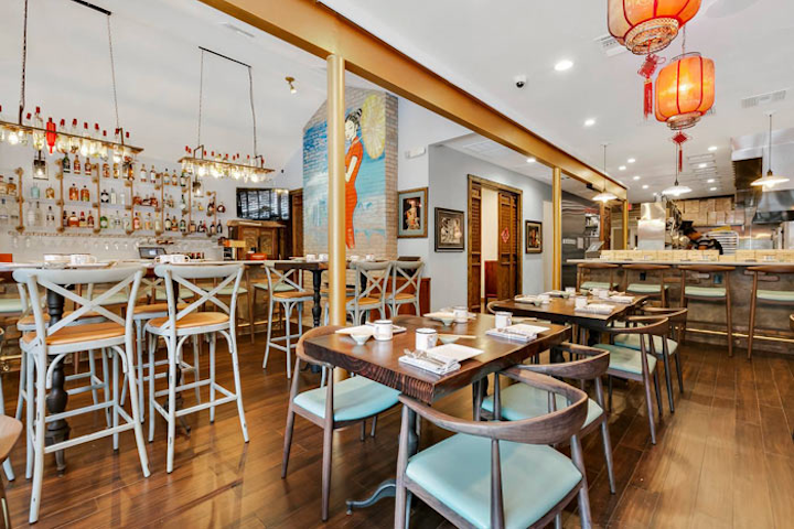 Lin Asian Bar brought Chinese food and dim sum to Austin in late spring. The menu features noodle dishes, meat entrees, and giant seafood soup dumplings. The stylish house features a patio with a ceiling of red lanterns, an indoor dim sum bar, and a private dining room for eight people.