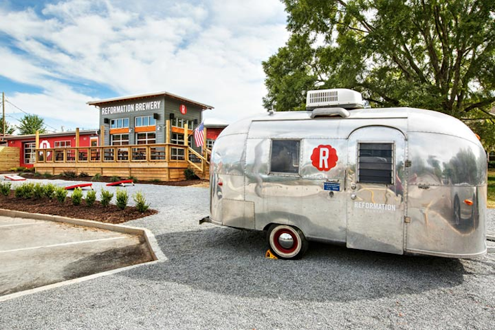 Reformation Brewery opened its second location in downtown Woodstock in September. The 6,000-square-foot, five-barrel brewhouse is home to the brewery’s research and development facility, as well as two public bars that serve 16 to 24 unique beers at any time. The brewery can hold more than 200 guests standing inside and has additional space at an expansive outdoor deck and beer garden. The facility is available for special events and meetings.