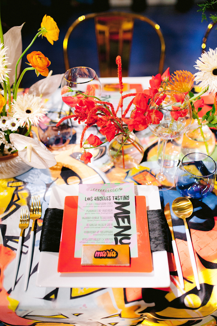 Whit Hazen handled florals and BBJ Linen provided graffiti-inspired linens. Roseville Designs handled the stationery. 'Diversity is a huge part of why L.A. is so compelling and what makes L.A. so special,' said Gray. 'The menu and place cards showcase names and cuisines of Korean, African-American, Hispanic, Vietnamese, and Armenian cultures; all crucial in the makeup of our city and sadly, rarely showcased in mainstream wedding publications.'
