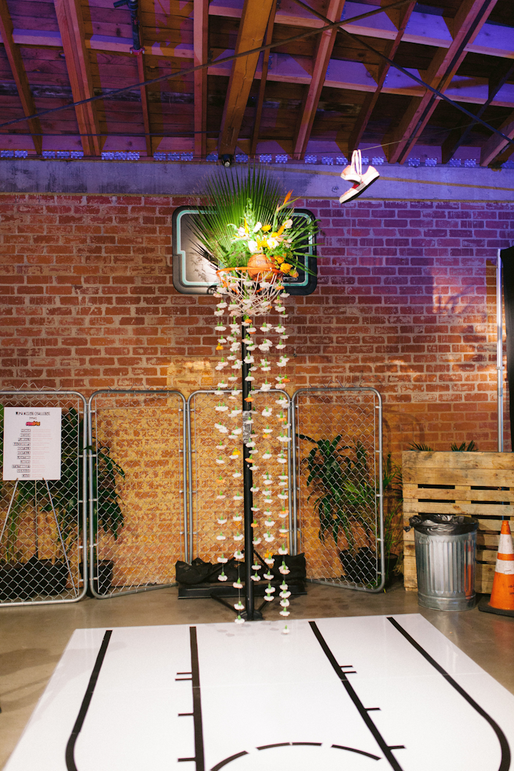 The space also had its own basketball court. 'It wouldn't be truly L.A. without including graffiti artwork, basketball, chain link, concrete, brick, palm fronds, street signs, and a little bling,' said Gray.