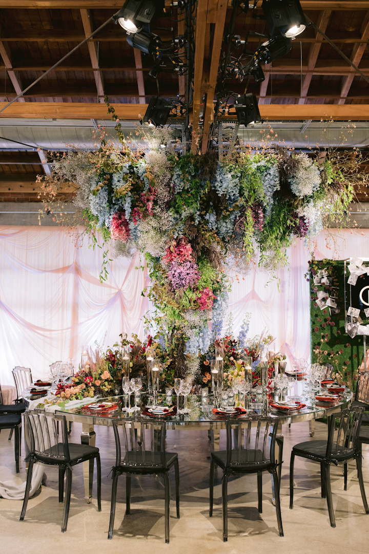 Sterling Engagements took on the 1940s, designing a lush, flower-filled space. Additional collaborators included Shawna Yamamoto Event Design, Edge Design & Decor, Revelry Event Designers, and Premiere Party Rents.