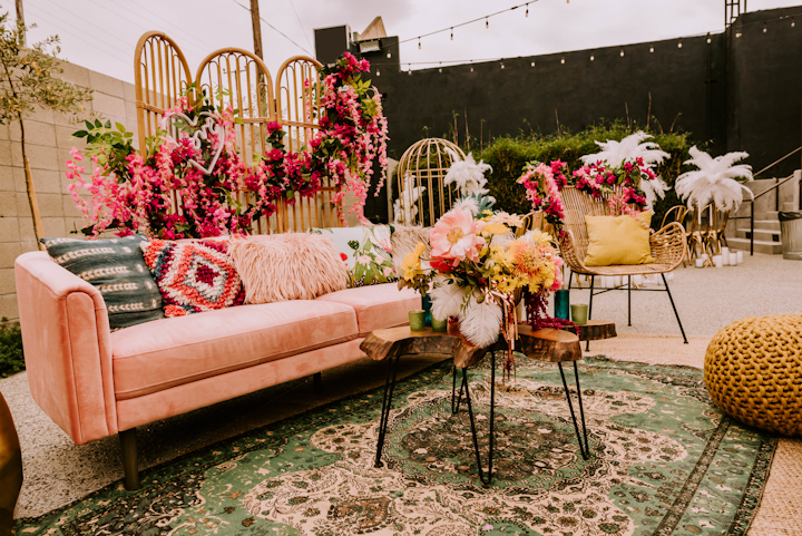 'This groovy 1970s concept is a groom and bride split between major rock and roll vibes and psychedelic femme fatale,' explained Lauren Montgomery, creative director for Collective Rentals Design House, which handled design and rentals for the space. Additional rentals came from La Piñata Party Rentals and Premiere Party Rents.