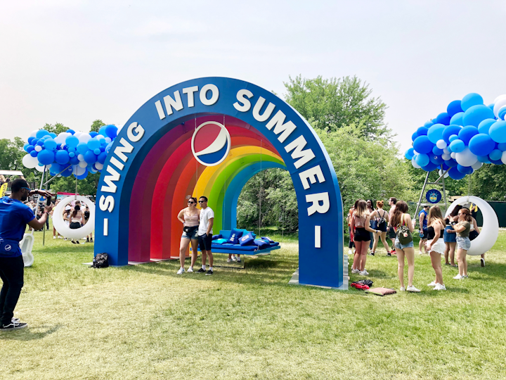 Pepsi’s experience was tied to the brand’s #Summergram campaign, highlighted by augmented-reality Instagram filters, which feature a variety of summer-theme statements and icons. The brand brought one of those icons to life in the form of rainbow photo booth and swings hanging from balloon clouds. ThinkMotive produced the activation.