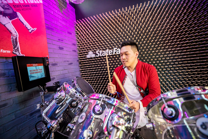 Guests could test their drumming speed and agility playing a custom drum set, which was housed in a mini music venue.