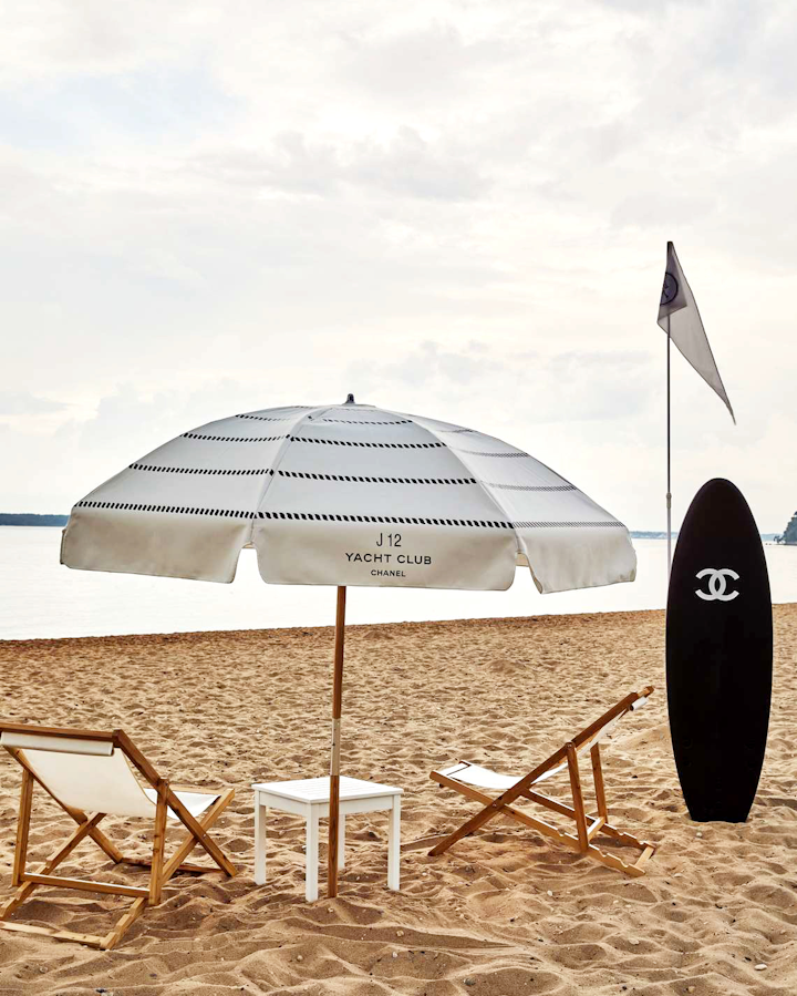 Chanel took over the Sunset Beach resort on Shelter Island in the Hamptons in July, to introduce and celebrate the new generation J12 fine timepieces. The pop-up, which was produced by Prodject, featured branded beach umbrellas and surfboards. See more: See How Gucci, Chanel, and Louis Vuitton Do Pop-Ups