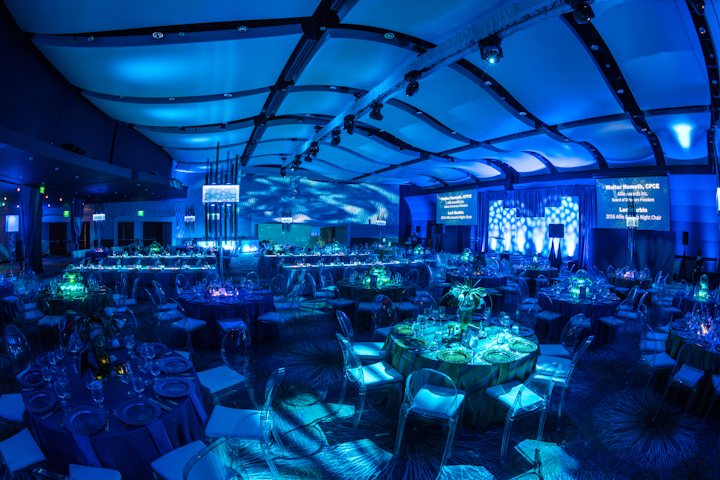 For the Allie Awards in Atlanta in March 2016, themed environments represented earth, water, and fire. Dinner took place in the water-inspired space which had deep blue lighting and blue rentals designed to make guests feel as though they were submerged in ocean waters. Active Production and Design built a custom stage set for the space. See more: 21 Events That Prove Monochromatic Color Schemes Are Anything But Boring
