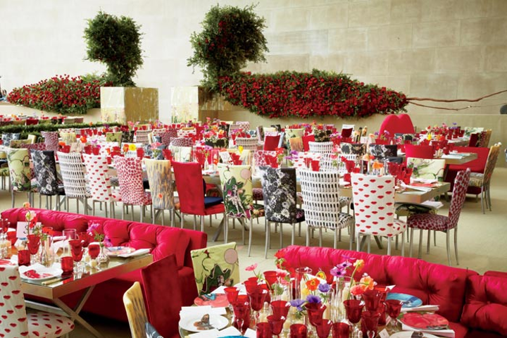 In 2012, the museum presented Schiaparelli & Prada: Impossible Conversations, which explored the aesthetic similarities between designers Elsa Schiaparelli and Miuccia Prada. For the gala dinner, held in the museum's Temple of Dendur, the chairs were upholstered with many of Prada's popular prints and were complemented by bright poppies and anemones on the tables, creating a whimsical feel that mimicked both women's fashion sensibilities. See more: Met Ball Uses 200,000 Roses to Craft Surreal Look Honoring Prada, Schiaparelli