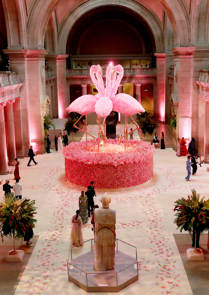 For the first time ever, Avila limited himself to basically one color. “Pink comes in different shades and to be able to harmonize the different palettes was an interesting way to not look too exaggerated,” he said. The floral centerpiece featured five 25-foot-tall flamingo statues with pink faux feathers and gold sequins and glitter covering their legs and beaks. See more: See Inside This Year’s Met Gala Filled with Feathers and Flamingos