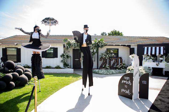 First up was 'Grad at the Pad,' a celebration for the class of 2020 that took over a front yard in Orange County, Calif. 'Instantly my mind went to entertainers on stilts,' said event designer Alexandra Rembac, nodding to the requirements to stay six feet apart from others.