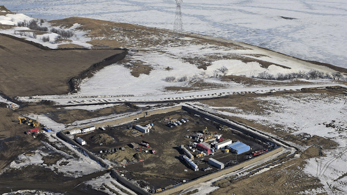 In this Feb. 13, 2017, aerial file photo shows the site where the final phase of the Dakota Access Pipeline will take place with boring equipment routing the pipeline underground and across Lake Oahe to connect with the existing pipeline in Emmons County near Cannon Ball, N.D. (Tom Stromme/The Bismarck Tribune via AP, File)