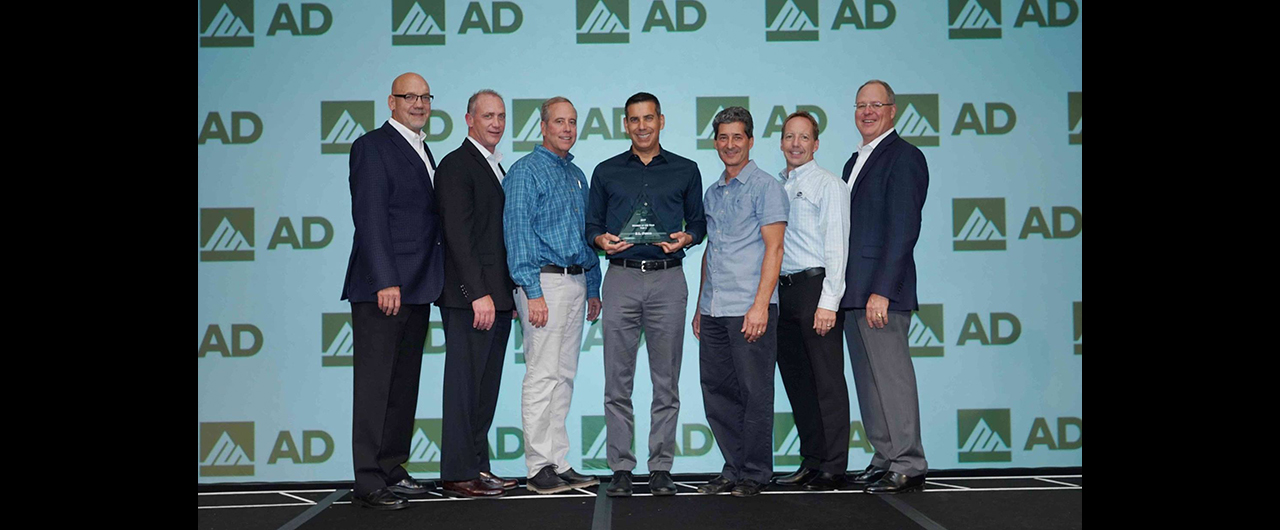 Members of S.L. Fusco accept AD Industrial's award for Tier 1 Member of the Year.