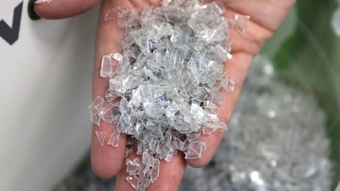 In this Thursday, Oct. 13, 2016, file photo, recycled plastic chips destined to be made in to thread are shown at the Repreve Bottle Processing Center, part of the Unifi textile company in Reidsville, N.C. On Wednesday, Jan. 3, 2018, the Institute for Supply Management, a trade group of purchasing managers, issues its index of manufacturing activity for December. (AP Photo/Chuck Burton, File)